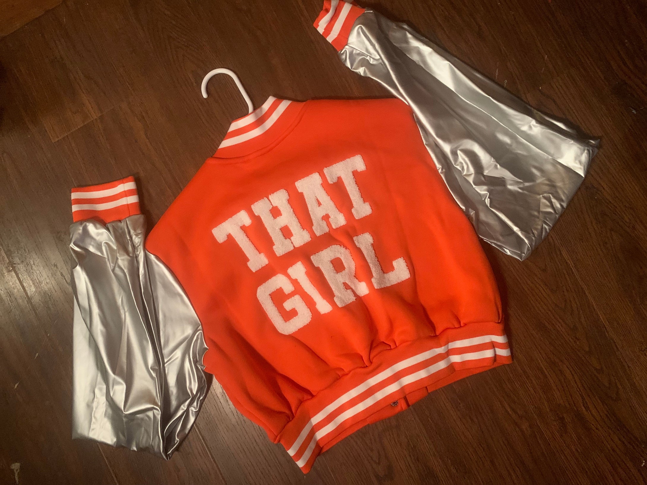 “That girl” orange cropped jacket